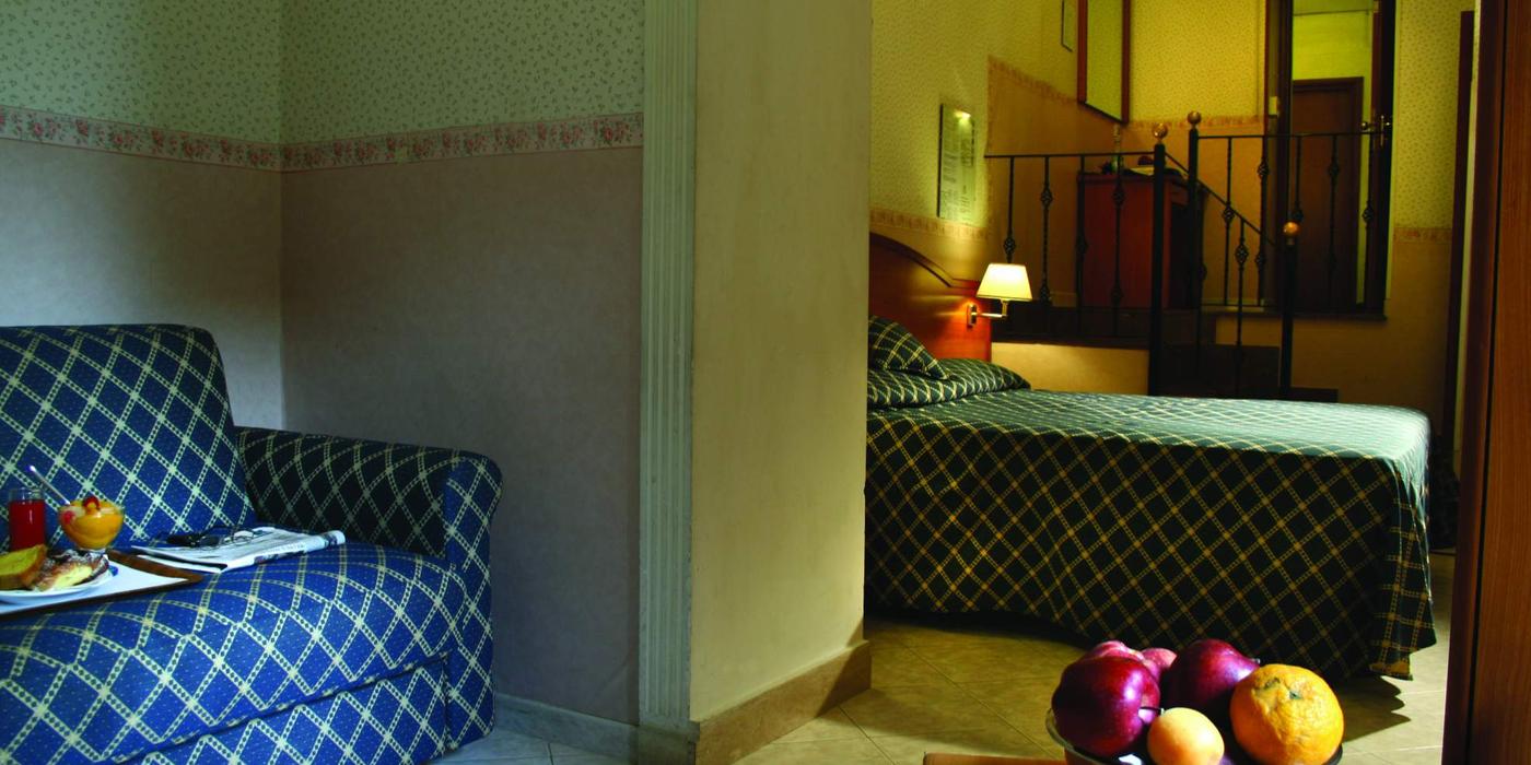 Habitación Triple Standard Habitación Triple Standard Hotel Delle Muse Roma Italia